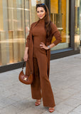 Looking for the perfect transitional fall-to-winter outfit? The Eirini Knitted Three-Piece Pants Set in Copper combines comfort and sophistication. A must-have for cozy nights and stylish daywear