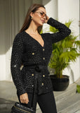 ShopPegasi belted black knit cardigan featuring subtle sequin embellishments
