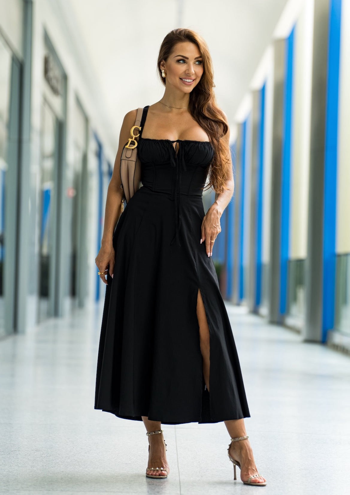 Sophisticated spring look in the Isabel Bustier Sundress – Black with fresh accents.