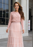 Two-piece blush pink knit set with cardigan and tiered tulle maxi skirt by shoppegasi.