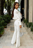 Statement white suit featuring a crystal-embellished blazer for added glamour