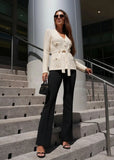 Cream belted knit cardigan with textured pattern, stylish and cozy outfit from Shop Pegasi.