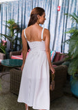 Feminine and fresh white bustier sundress, ideal for spring celebrations