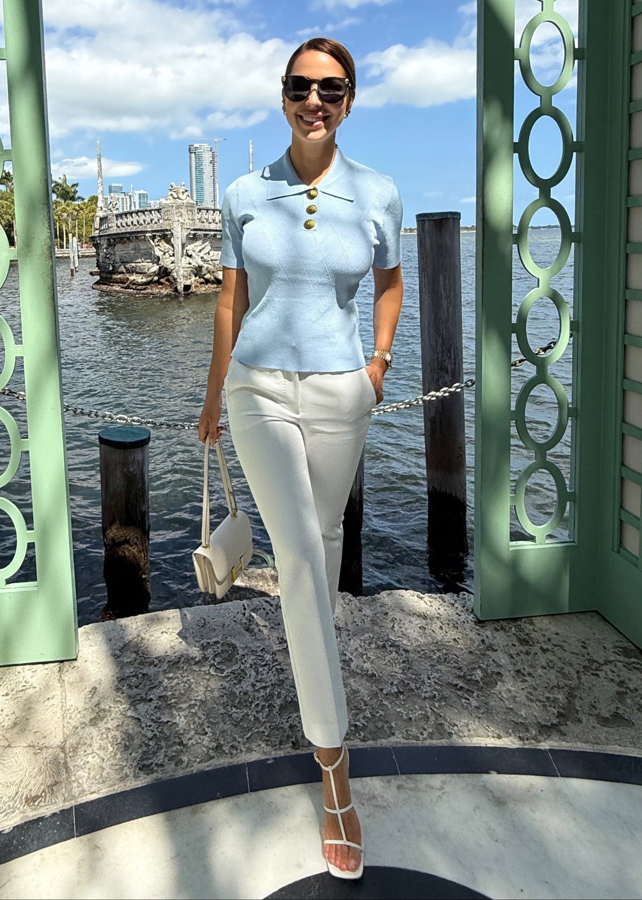 "Skyline Blue women's polo top with a classic collar and soft cotton blend"