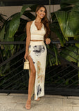 Pegasi Isadora floral co-ord with flowy slit skirt and wrap halter top