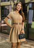 Women’s Giulia buttoned pleated midi dress at ShopPegasi, a soft textured fabric dress with a chic fit-and-flare silhouette.