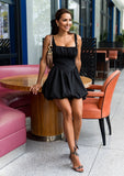 Vestido mini peplum negro Odilia