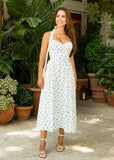 Irine Floral Halter Neck Dress showcasing a halter neckline and elegant all-over floral pattern