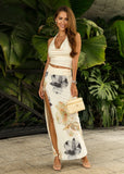 Floral halter neck top paired with a flowing maxi skirt set