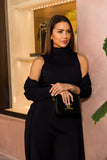 The Pegasi- Eirini Knitted Three-Piece Pants Set in Black—featuring a soft-knit top, stylish cardigan, and matching pants for a cozy yet sophisticated look. Perfect for layering and all-day comfort.