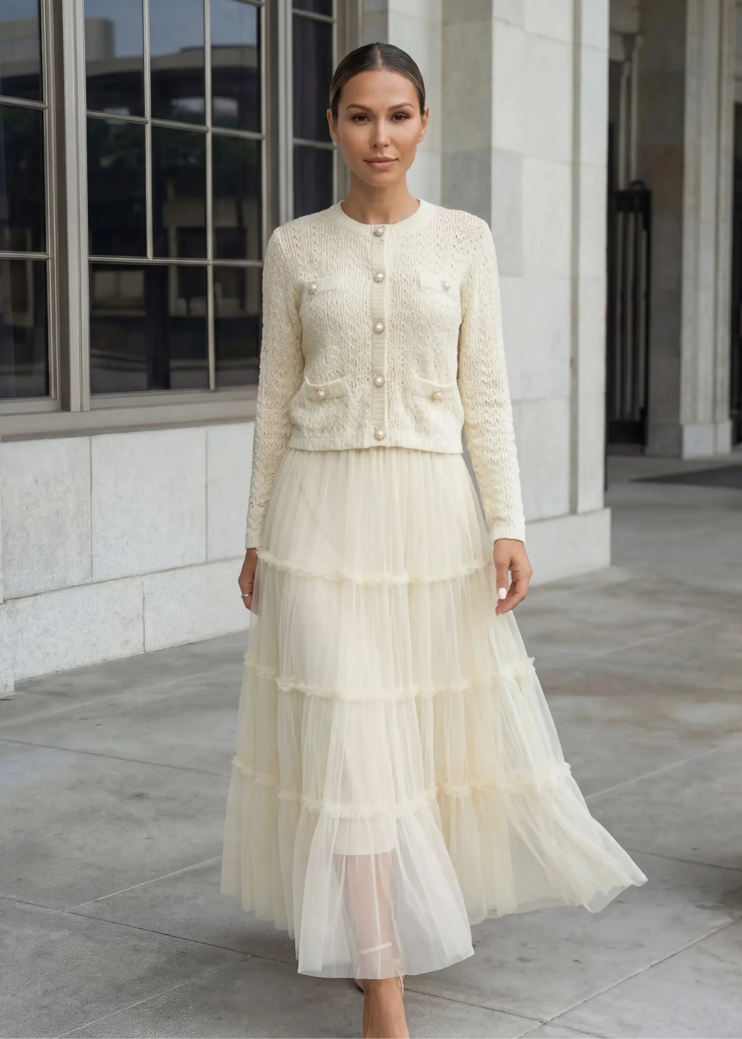 Romantic yellow tiered tulle skirt and crop top two-piece set with soft ruffle details.