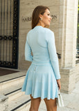 Carina pleated knit co-ord from ShopPegasi featuring a ribbed button cardigan and pleated skirt, a timeless knitwear skirt and cardigan outfit. 