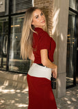 Side view of Sienna deep red knit co ord top and skirt