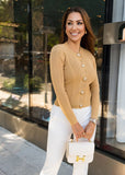 ShopPegasi’s beige ribbed knit cardigan, perfect for casual or dressed-up looks