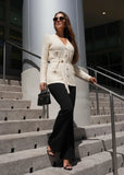 Cream knit cardigan with belt and textured pattern, chic casual knitwear from Pegasi.