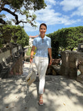 Stylish women's polo top in Skyline Blue, ideal for work or weekend wear"