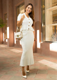 White midi skirt and short sleeve cardigan set in breathable pointelle knit. A chic, easy-to-style outfit perfect for casual outings or dressed-up looks for the season.