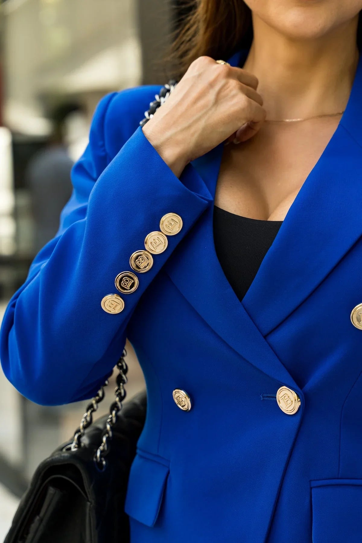 Women’s royal blue tailored blazer with gold buttons for elegant office and formal wear.