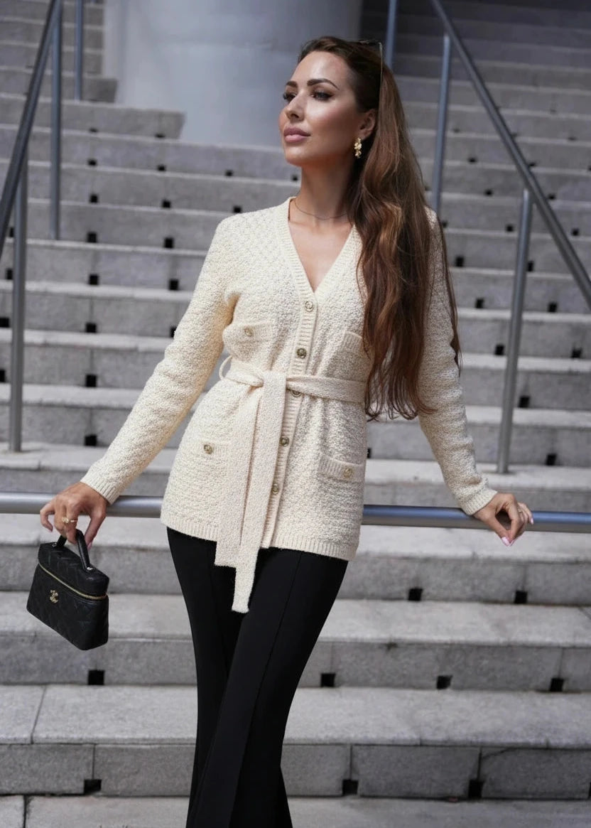 Women's cream knit cardigan with belt, textured design, comfortable and chic from Pegasi.