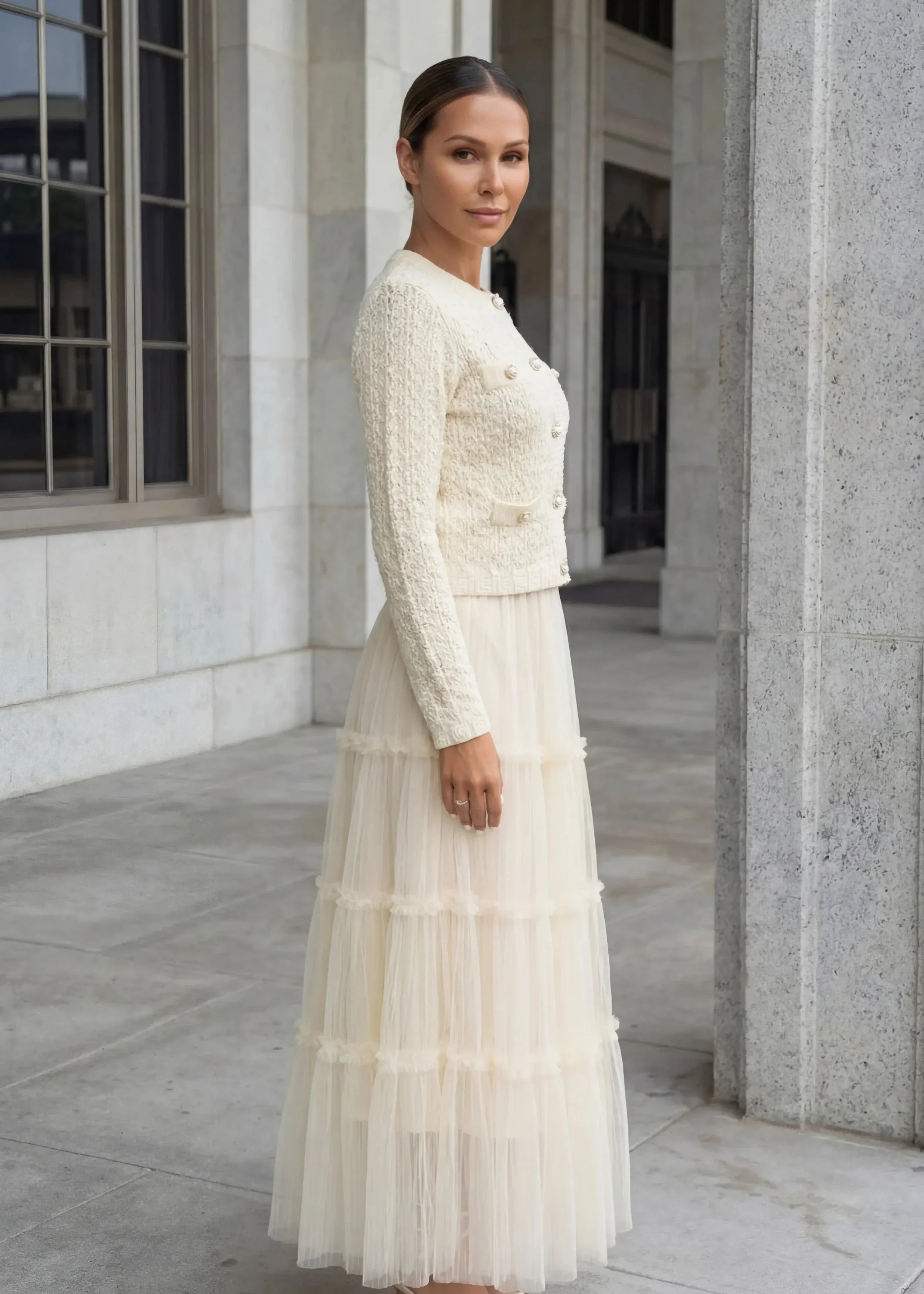 Yellow romantic tulle skirt and crop top set designed with airy layers and ruffle detailing.