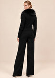 Back and side view of woman walking in black knit cardigan and wide-leg pants set