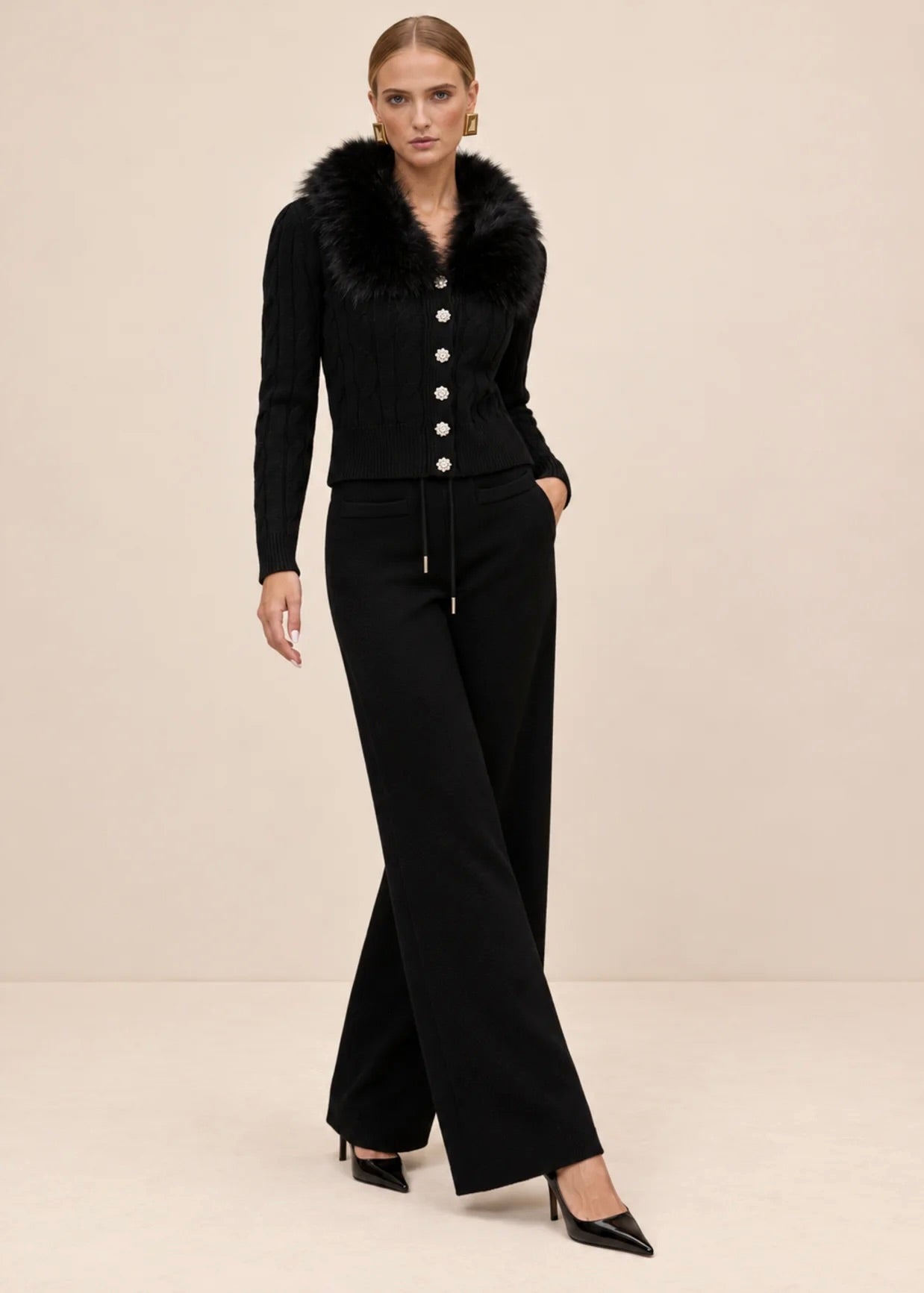 Black cable knit cardigan and wide-leg pants set, full length front view