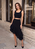 Black crop top skirt set for women with an asymmetric ruffle midi skirt, perfect for a night out
