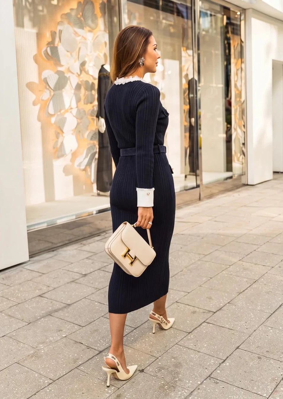 Side view of black ribbed knit maxi dress