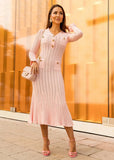 Blush pink ribbed knit midi dress with button detail front view
