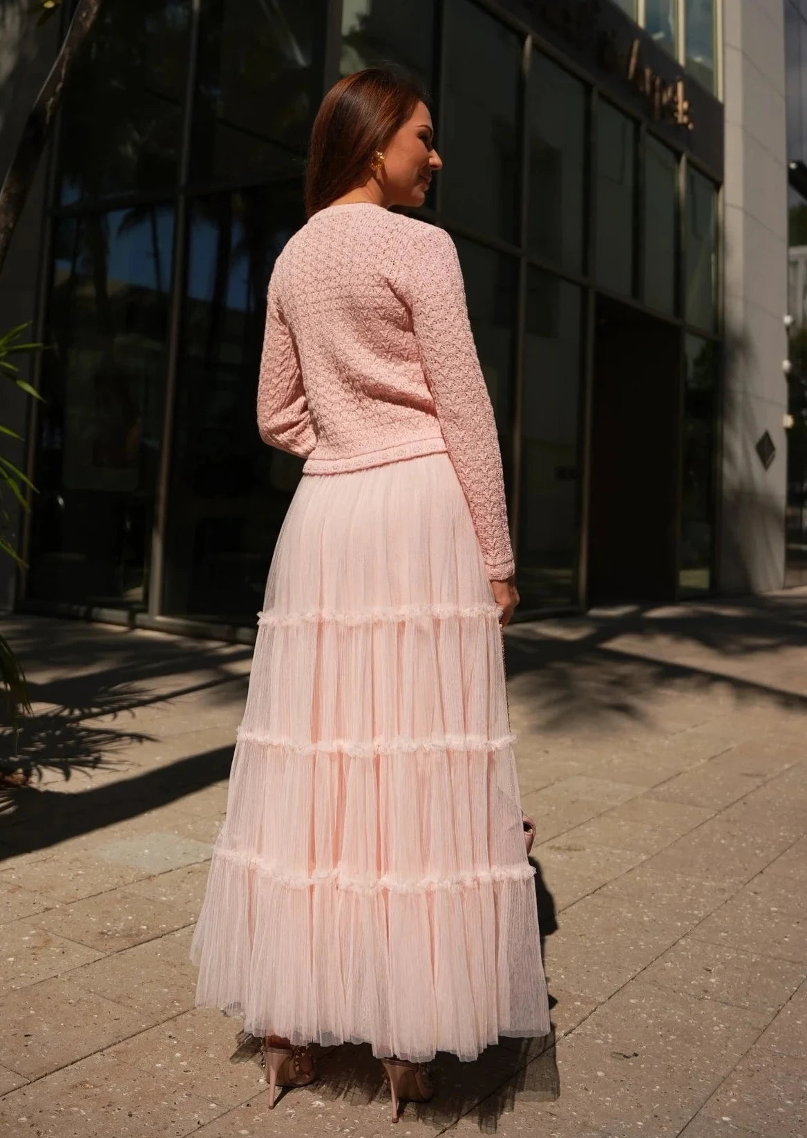 Blush tiered tulle set styled for events and formal gatherings