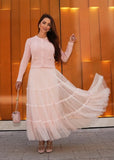 Blush tiered tulle set styled for romantic occasions with layered airy tulle skirt