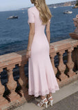 Back view of Cosima pink maxi dress made from soft ribbed knit fabric