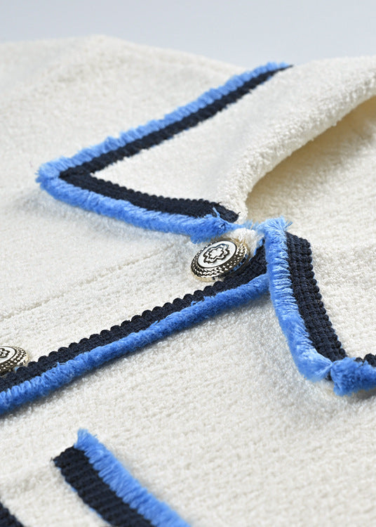 cropped short sleeve knit jacket with contrast trim and front pockets detail
