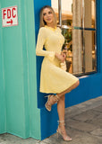 Side view of yellow knit midi dress with fitted waist and flared skirt