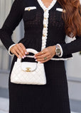 Elegant winter dress, floor-length fit and flare skirt with pearl-trimmed hem