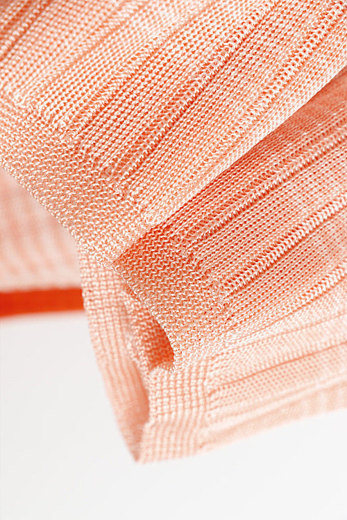 Close-up of Fiorella ombre ribbed knit midi dress showing textured fabric and gradient detail