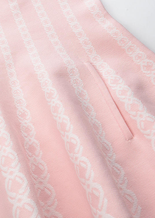 close up of blush pink knit dress neckline and soft fabric detail