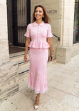 Pink knit cardigan and skirt set for women featuring lace panels and a feminine design