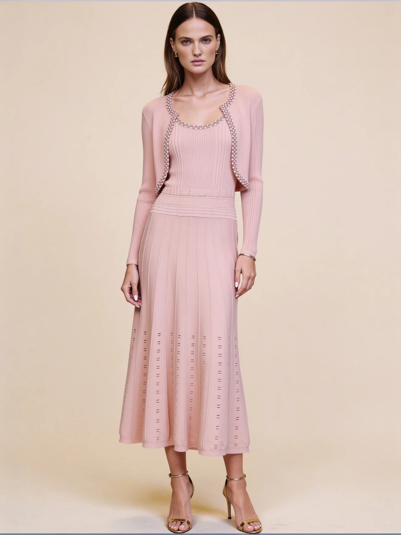 PEGASI pink ribbed knit cardigan and midi dress set with pearl and crystal trim, cardigan worn open, front view