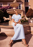 blue pointelle knit dress featuring a button-front bodice and floor-length skirt