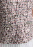 close up view sleeveless tweed midi dress with pleated skirt