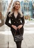 Luxury meets confidence in this black blazer and pants suit set.