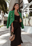 Chic and timeless green blazer with statement gold buttons – perfect for formal wear