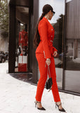 Elegant red power suit with a tailored fit – blazer and trousers set.