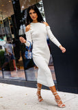 ShopPegasi's white dress with tailored fit and statement cut-out detail on one shoulder

