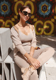 ShopPegasi knitted lounge set – a comfy three-piece outfit featuring a soft top, cardigan, and matching pants