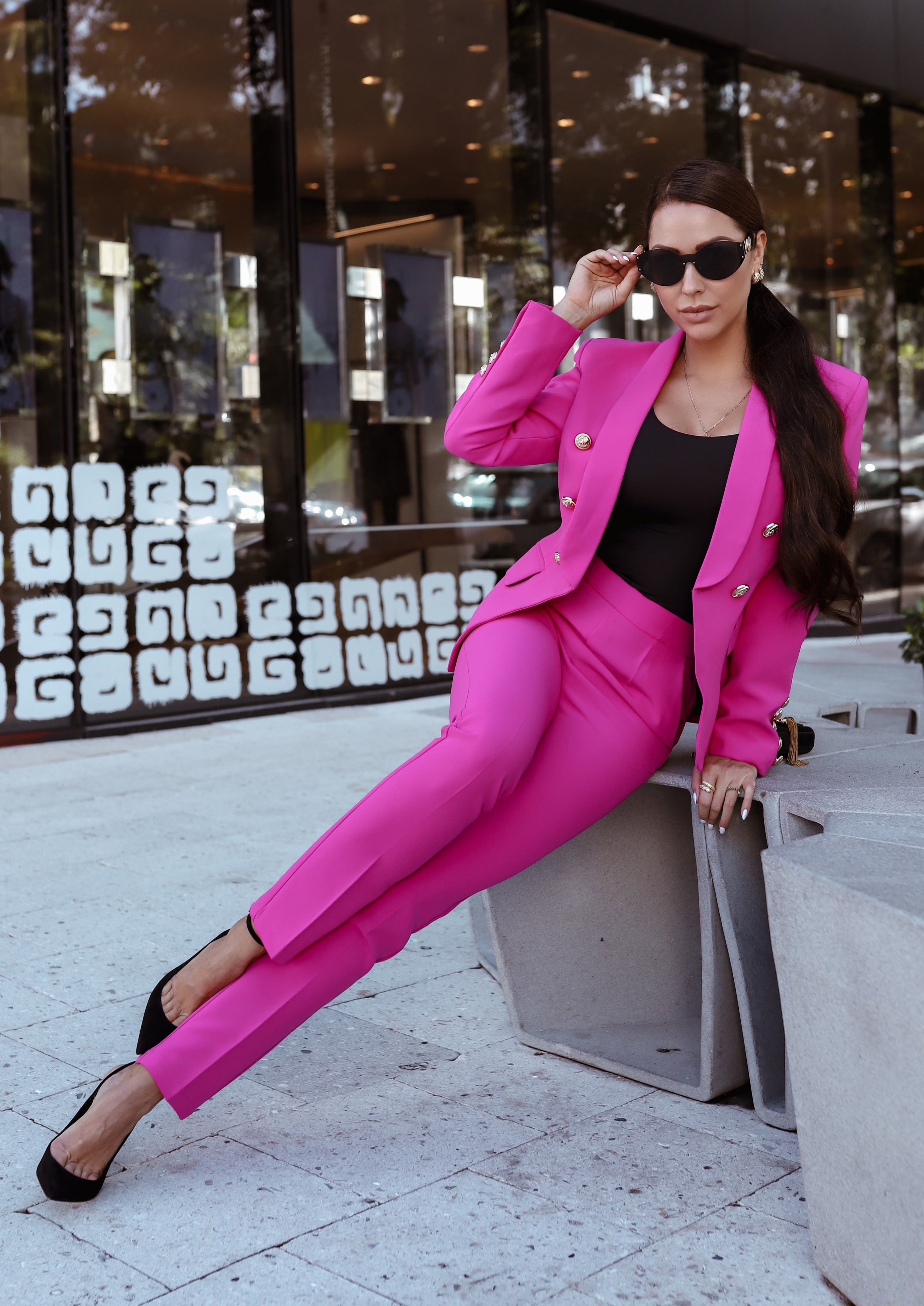 Luxury women’s double-breasted blazer and fitted pants set in vibrant pink.berry double-breasted blazer and pants suit set for women