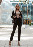 Refined black blazer and tailored trousers – a power suit like no other