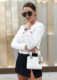 Stay stylish and comfortable with the ShopPegasi white cropped knit cardigan—versatile for day or night