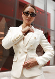 Creamy white double breasted blazer and pants suit with gold-tone buttons